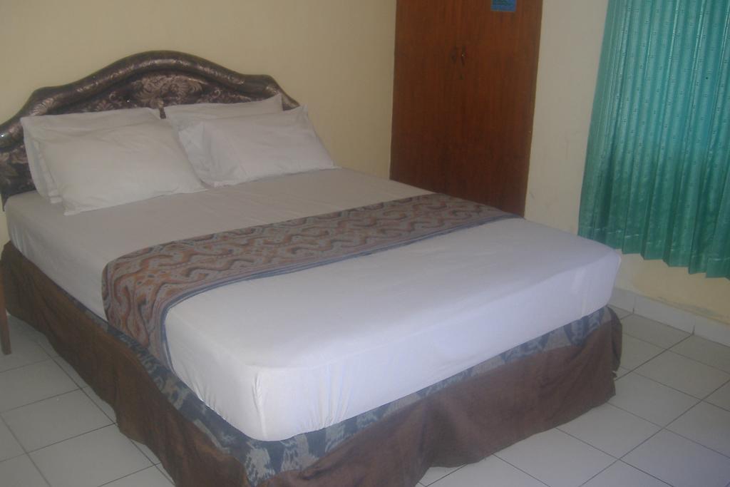 Mustika Inn Kuta Lombok Pokoj fotografie