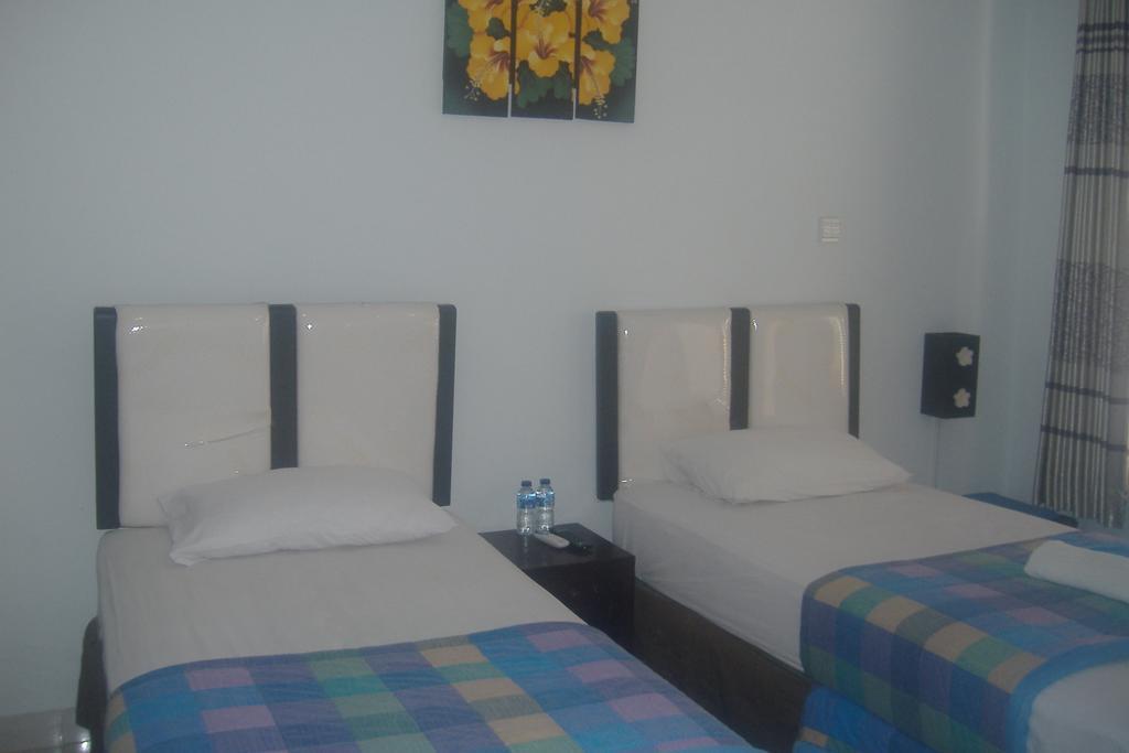 Mustika Inn Kuta Lombok Pokoj fotografie