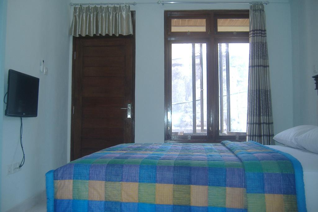 Mustika Inn Kuta Lombok Pokoj fotografie